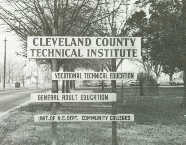 In October 1967, the Cleveland County Unit of Gaston College gained independence and officially became Cleveland Technical Institute. In late summer and fall of 1969, the Institute moved to new quarters on South Post Road and began operating in the former County Home buildings. This sign on Post Road indicates the focus of the Institute at that time. From the beginning, the College was a member of the North Carolina Department of Community Colleges, which is now the North Carolina Community College System.